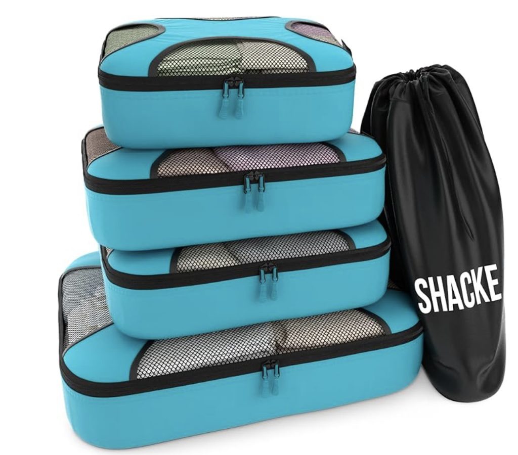 Set of 4 packing cubes to keep clothes compressed and organized within your luggage
